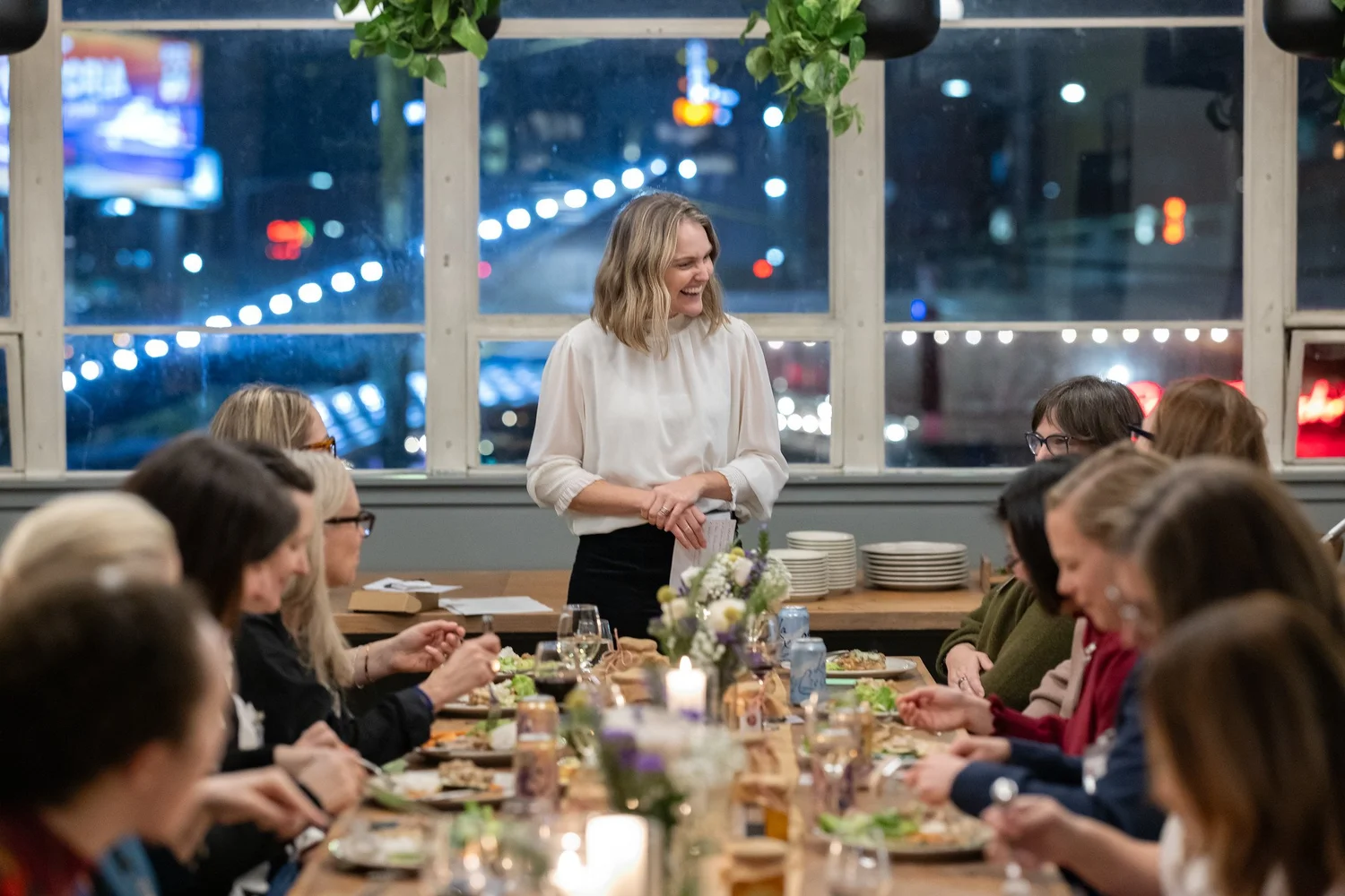 Leaders around a table at a triwoven gathering